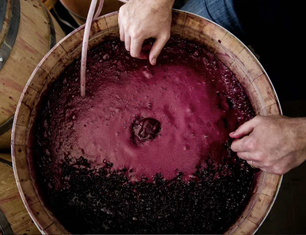 Grape juice in barrel being aerated
