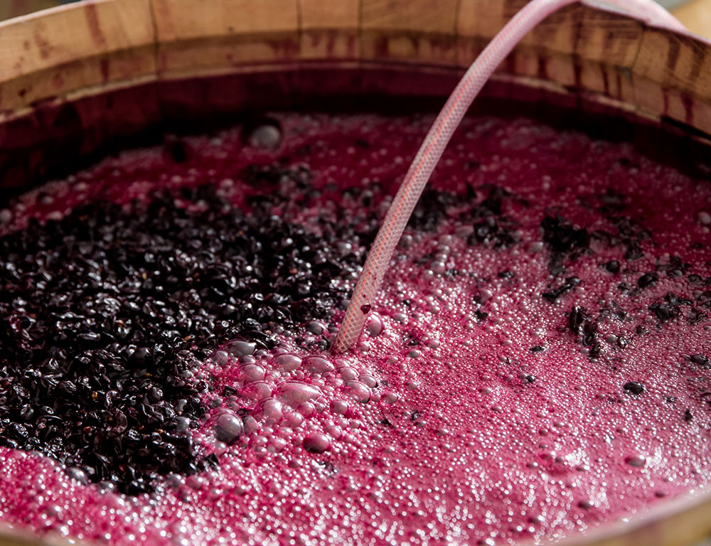 Grape juice in barrel being aerated